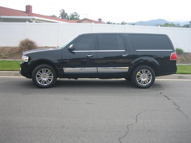 Black Navigator Limo by Coachman Enterprises Limo Service