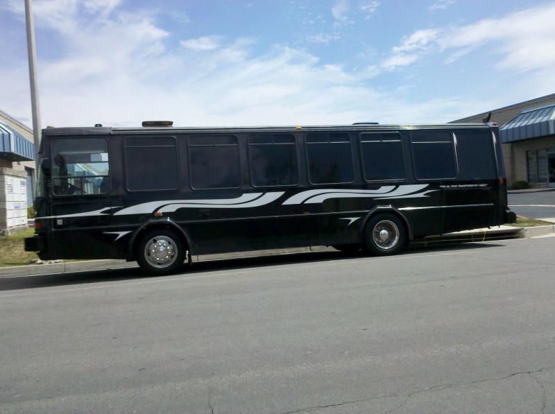 Black Party Bus Limo by Coachman Enterprises Limo Service